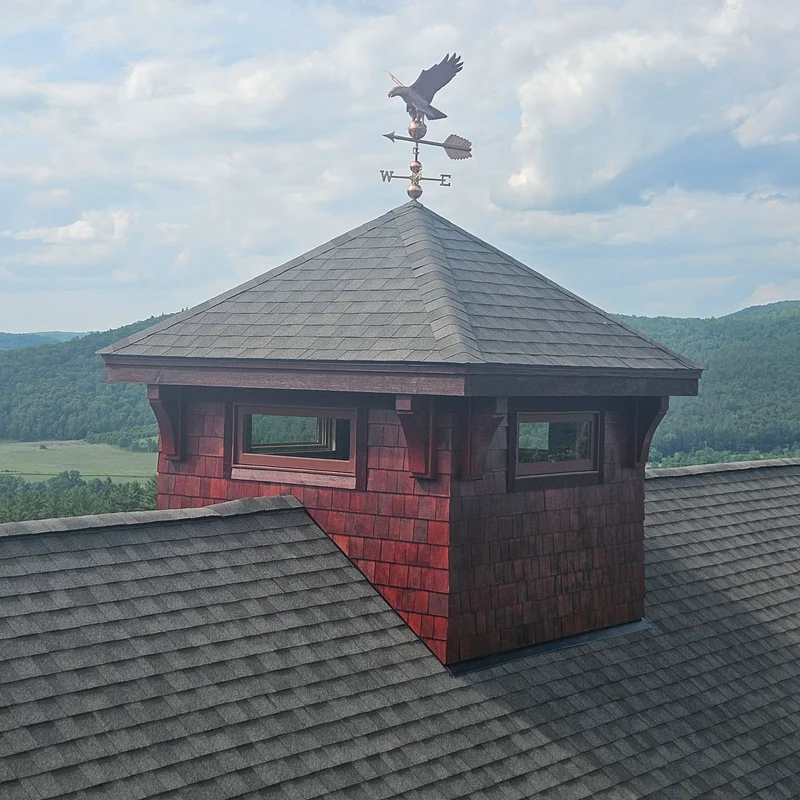 Timber frame construction showing exposed beams and craftsmanship in Littleton NH
